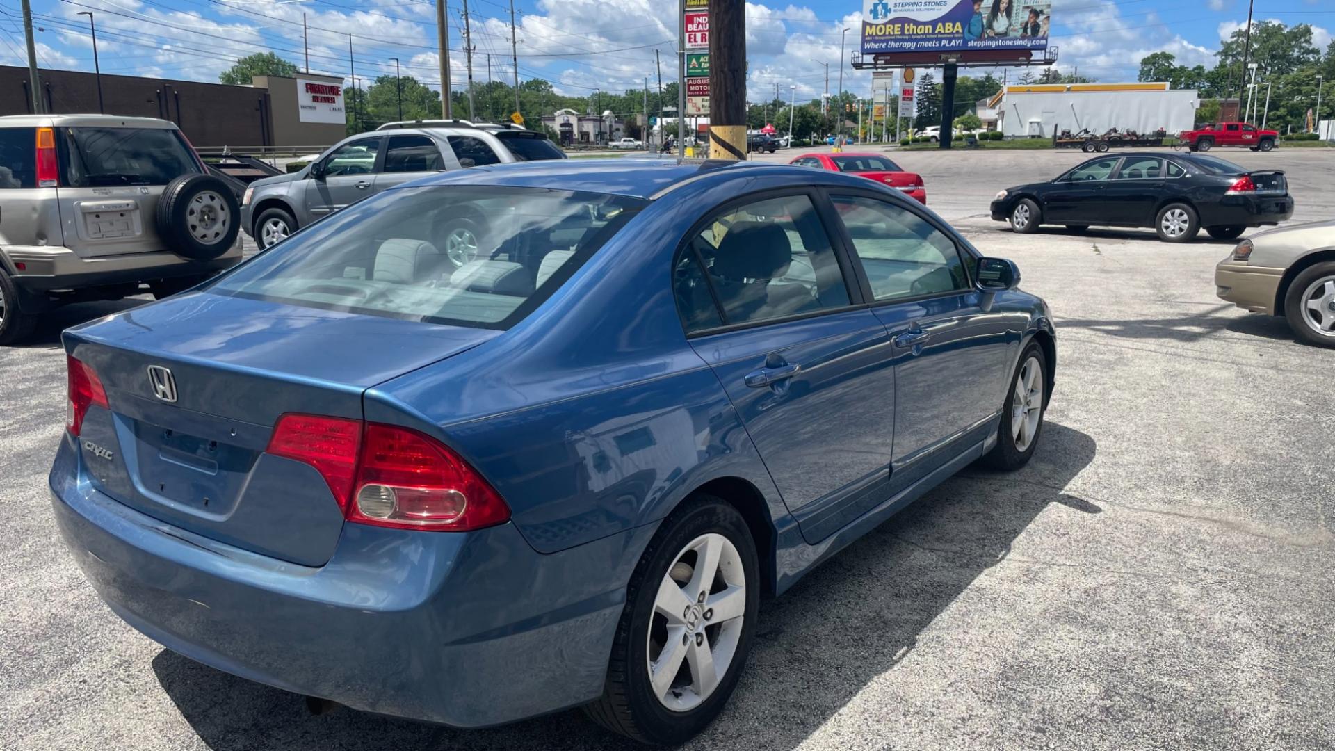 2006 BLUE Honda Civic EX Sedan (1HGFA158X6L) with an 1.8L L4 SOHC 16V engine, 5-Speed Manual transmission, located at 2710A Westlane Rd., Indianapolis, IN, 46268, (317) 291-2000, 39.885670, -86.208160 - Photo#3